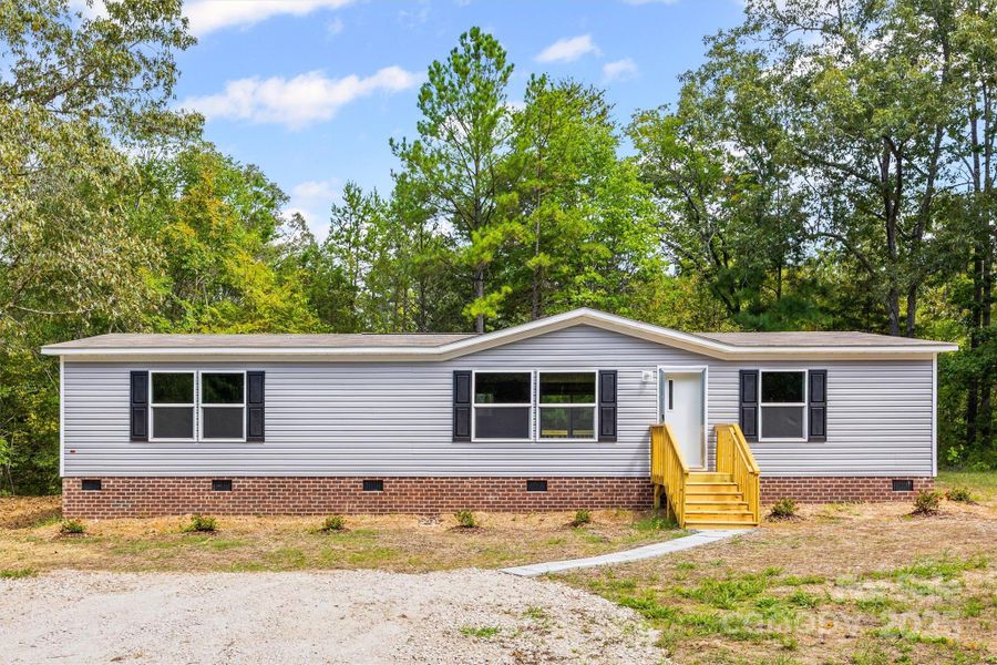 Front exterior of a new home in , Sharon, SC, highlighting curb appeal (Image 13). Front exterior of a new home in , Sharon, SC, highlighting curb appeal (Image 13).
