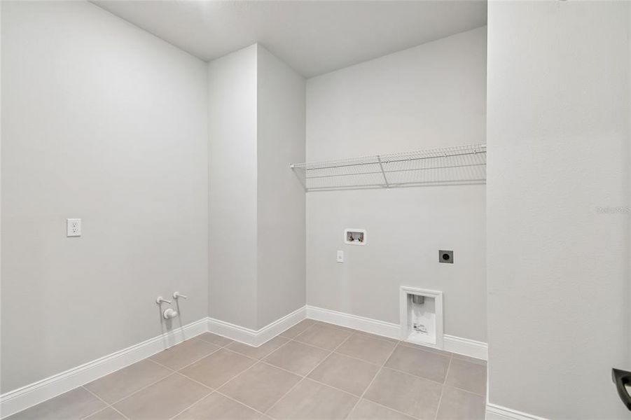 Spacious, unfurnished interior of a new home in Oakfield at Mount Dora Village Series, Mount Dora (Image 26).