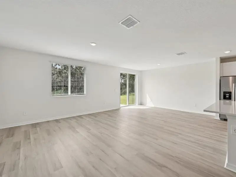 Spacious, unfurnished interior of a new home in The Reserve at Van Oaks, Auburndale (Image 18).