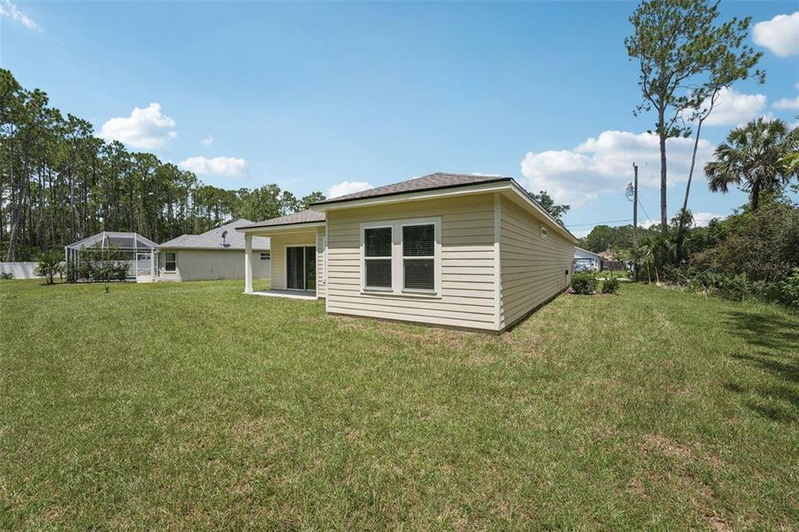 Exterior details and patio area of a home in , Palm Coast (Image 19).