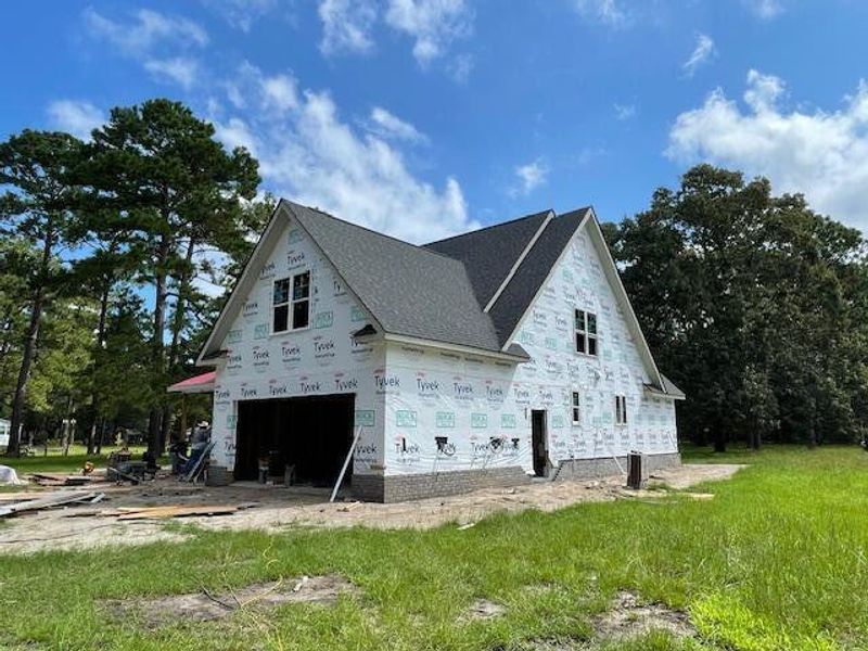 Front exterior of a new home in , Hollywood, SC, highlighting curb appeal (Image 15).