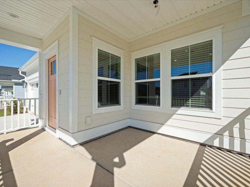 Exterior details and patio area of a home in The Coves at Lakes of Cane Bay, Summerville (Image 3).