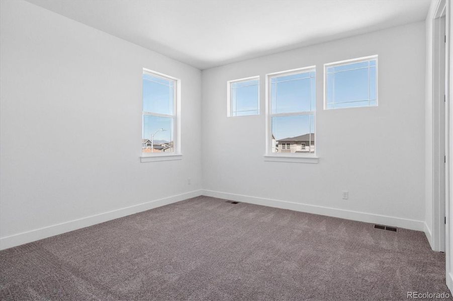 Spacious, unfurnished interior of a new home in Peakview at Ascent Village, Littleton (Image 39).