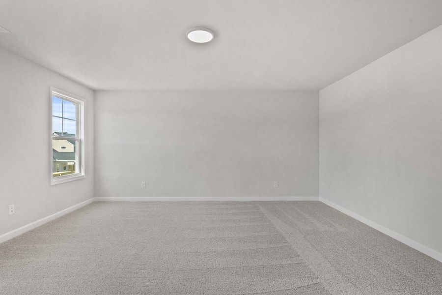 Representative unfurnished interior of a home built from the Camellia by Caviness & Cates Communities in Bartlett Manor, Youngsville (Image 95).