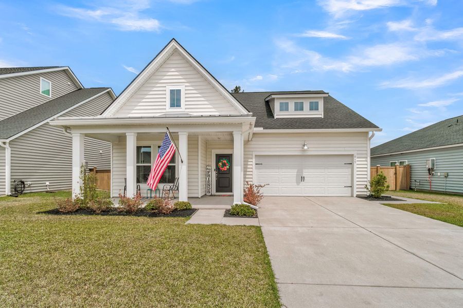 Front exterior of a new home in Heron's Walk at Summers Corner, Summerville, SC, highlighting curb appeal (Image 21).