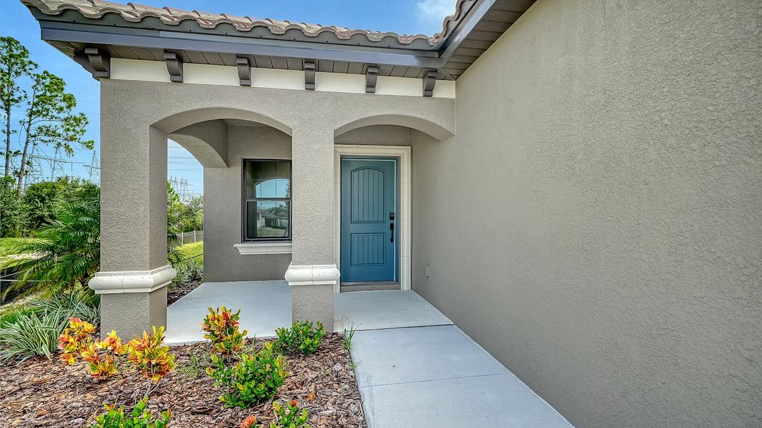 Exterior details and patio area of a home in Vicenza Real Estate and Homes for Sale in North Venice, FL - Neal Communities, Venice (Image 2).