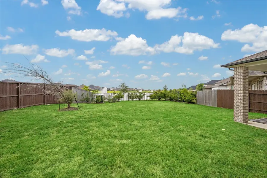 Exterior details and patio area of a home in Del Bello Lakes – 60', Manvel (Image 22).