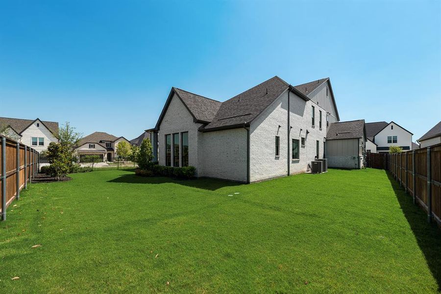 Exterior details and patio area of a home in Light Farms Graham/Reagan, Celina (Image 25).