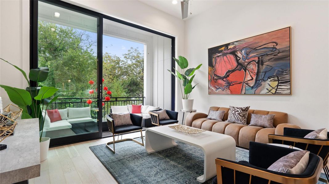 open, unobstructed views/views of green trees from the balcony