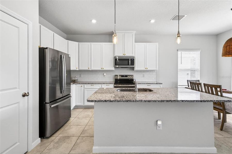 Furnished interior view inside a new home in Summerwoods, Parrish (Image 12).