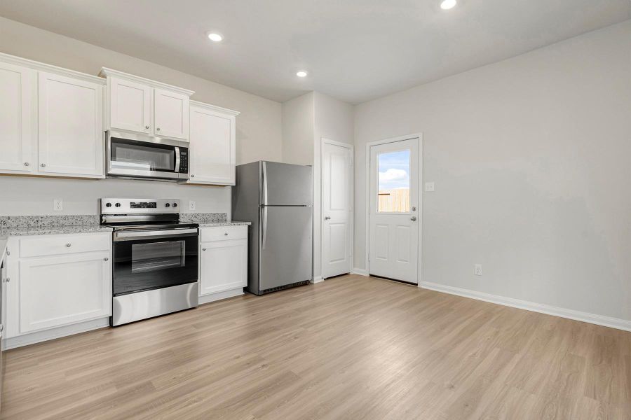 Furnished interior view inside a new home in Cypress Trails at Bauer Landing, Hockley (Image 3).