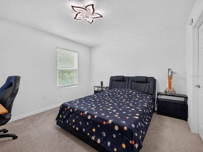 Furnished interior view inside a new home in Storey Creek, Kissimmee (Image 50).