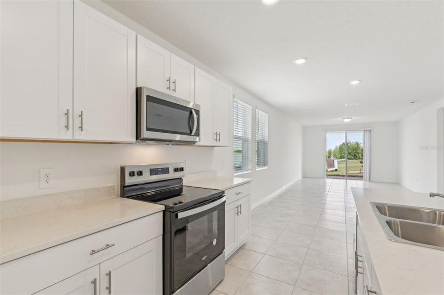Furnished interior view inside a new home in Eden Hills, Lake Alfred (Image 10).
