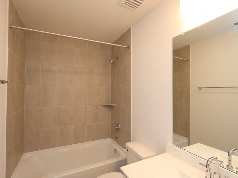 Furnished interior view inside a new home in Magnolia Ridge, Magnolia (Image 14).