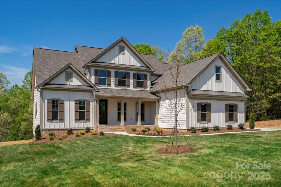 Please Note Photos are of completed home with similar finishes.   Plan to be reversed on this homesite