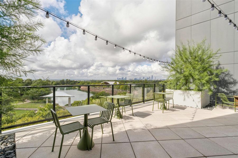 Rooftop terrace with views of Mueller Lake and downtown Austin
