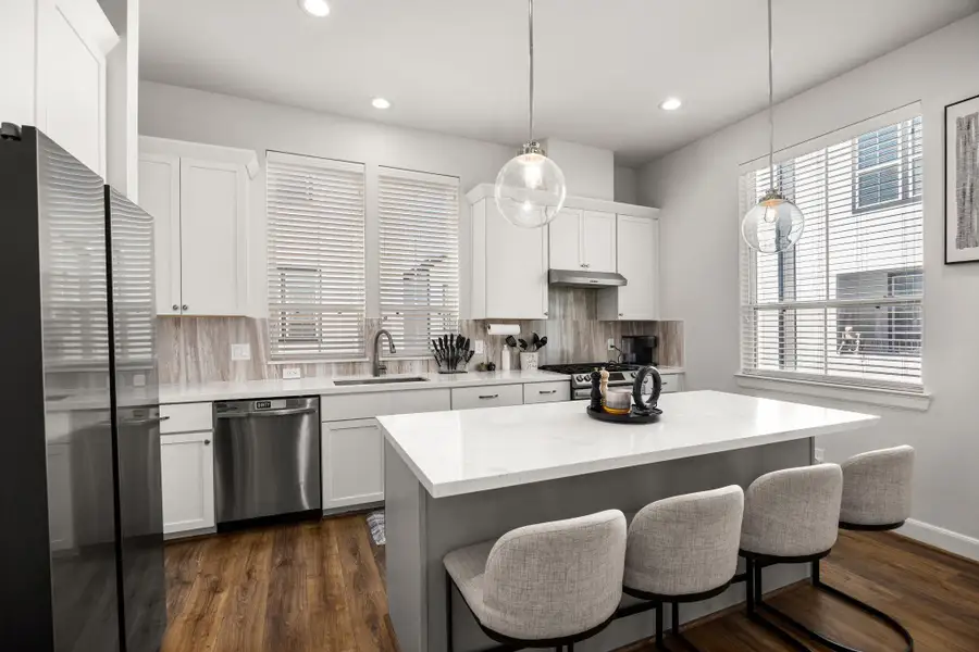 Furnished interior view inside a new home in The Corner At Buffalo Pointe, Houston (Image 11).