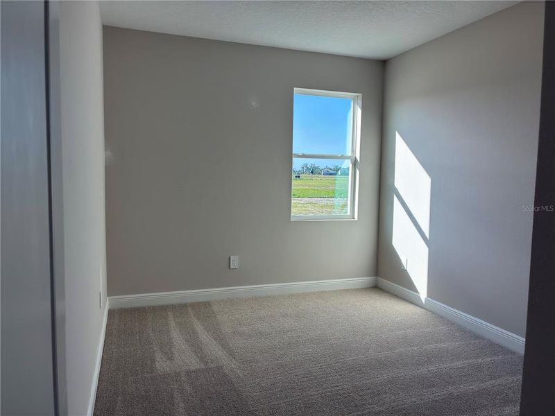 Spacious, unfurnished interior of a new home in Oakfield Trails, Parrish (Image 13).