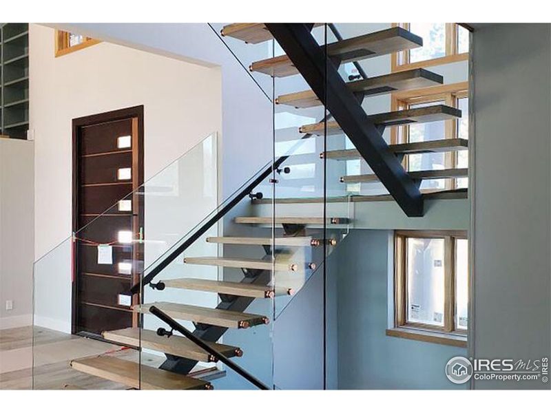 PICTURE NOT OF ACTUAL HOME - Concept of Open Riser stair to be included in home