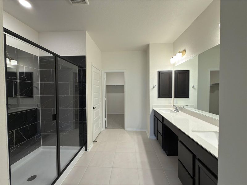 Furnished interior view inside a new home in River Bluff, Leander (Image 14).