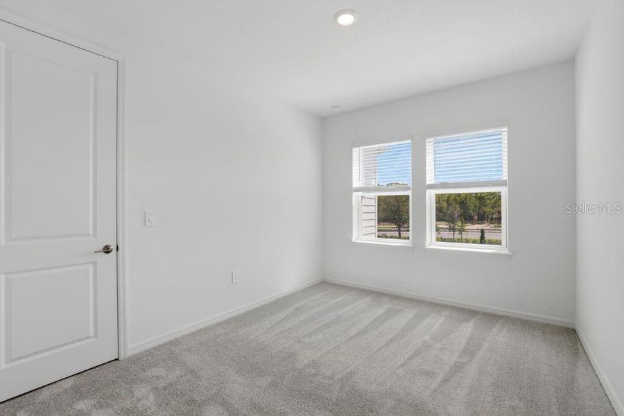 Spacious, unfurnished interior of a new home in Firethorn, Parrish (Image 24).