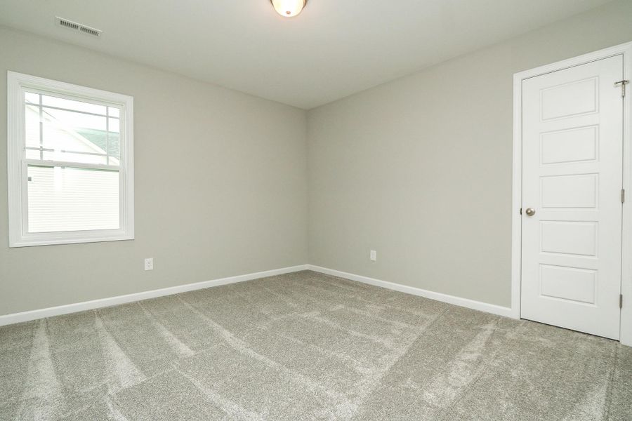 Representative unfurnished interior of a home built from the Palmer Plus by RiverWILD Homes in Riverwood Ranch, Clayton (Image 11).