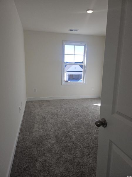 Spacious, unfurnished interior of a new home in Avery Woods, Longs (Image 26).