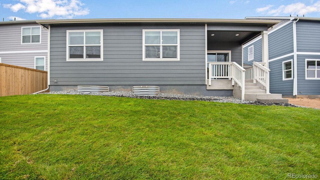 Exterior details and patio area of a home in Trails at Crowfoot, Parker (Image 27).