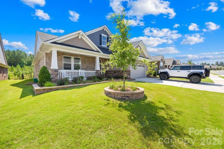 Front exterior of a new home in Sonata at Mint Hill, Mint Hill, NC, highlighting curb appeal (Image 23).
