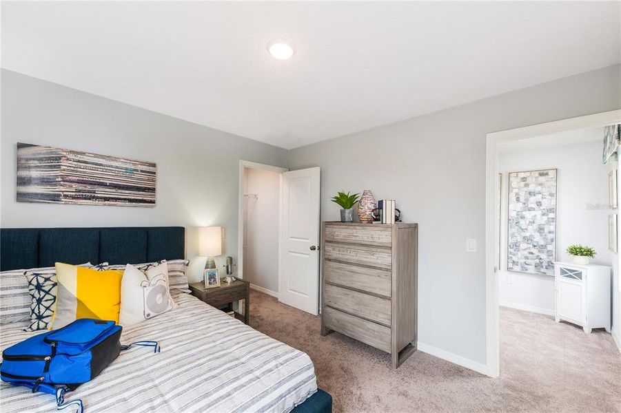 Furnished interior view inside a new home in Waterstone, Groveland (Image 11). Furnished interior view inside a new home in Waterstone, Groveland (Image 11).