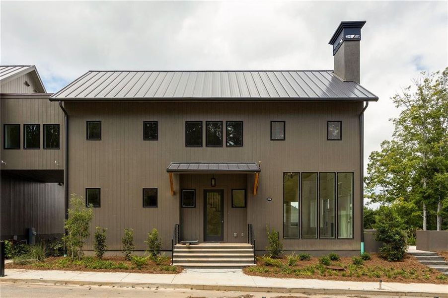 Front exterior of a new home in , Chattahoochee Hills, GA, highlighting curb appeal (Image 1). Front exterior of a new home in , Chattahoochee Hills, GA, highlighting curb appeal (Image 1).