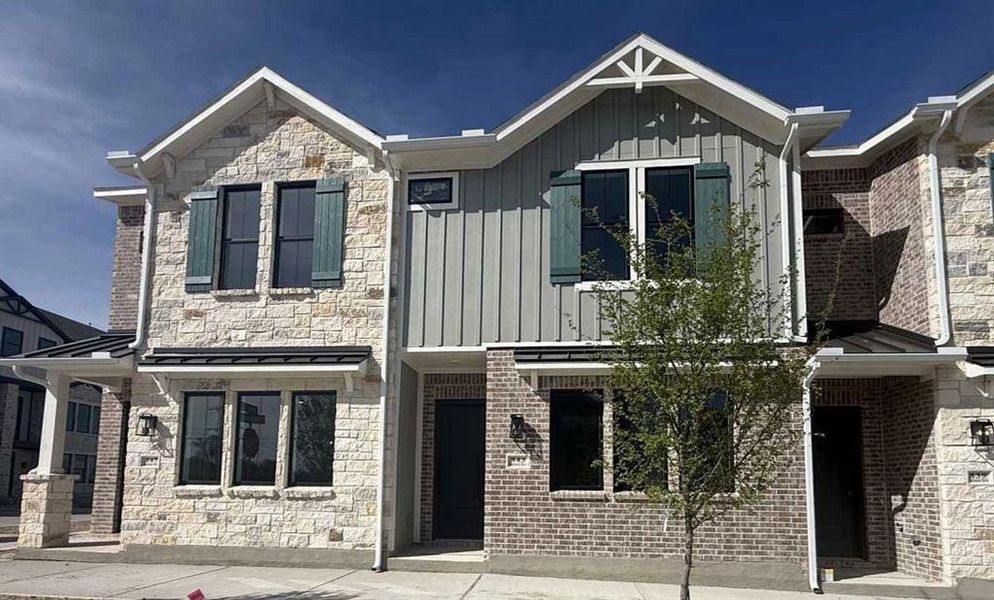 Front exterior of a new home in Collin Creek, Plano, TX, highlighting curb appeal (Image 14).
