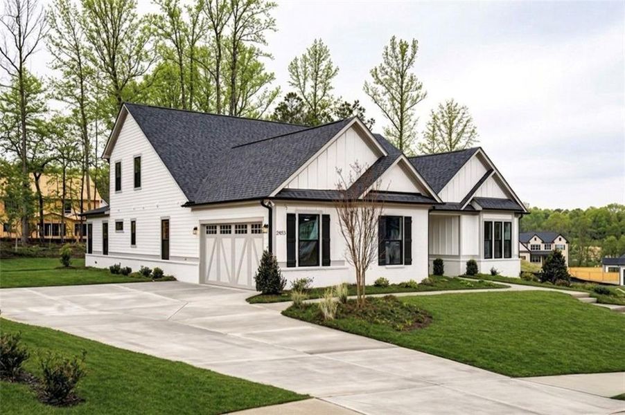 Front exterior of a new home in , Cumming, GA, highlighting curb appeal (Image 27).