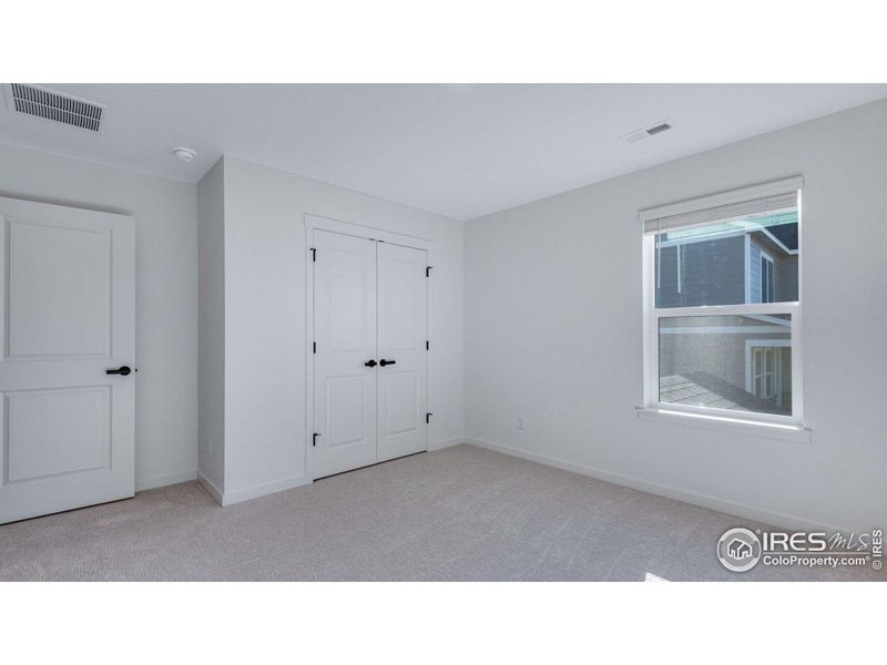 Spacious, unfurnished interior of a new home in Vista Meadows, Fort Lupton (Image 29).
