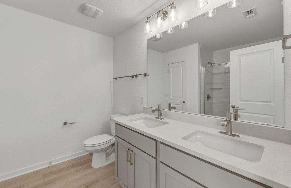 Furnished interior view inside a new home in Cameron Place, Manor (Image 9).