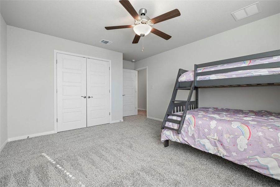 Secondary Bedroom with Ceiling Fan.