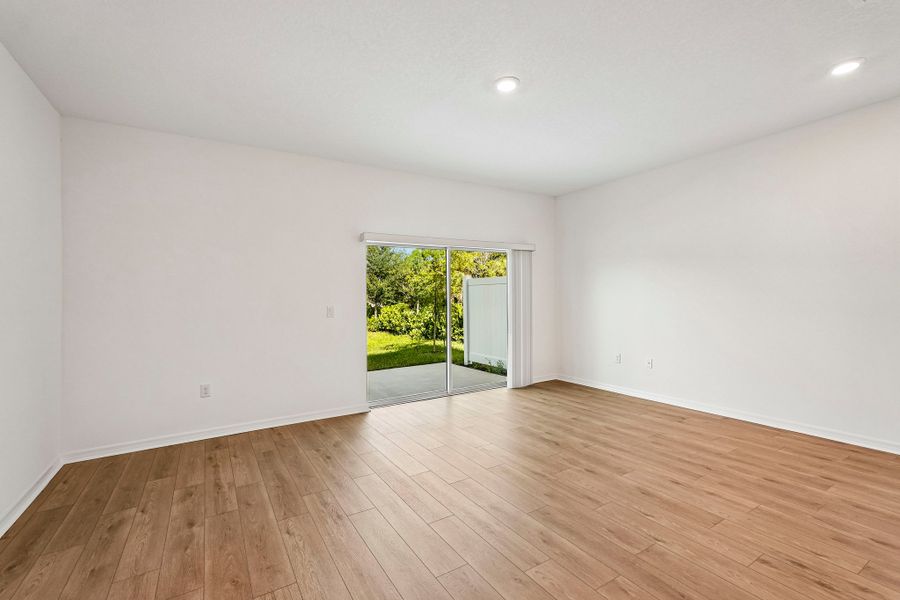 Spacious, unfurnished interior of a new home in The Towns at Tiburon, Nokomis (Image 9).