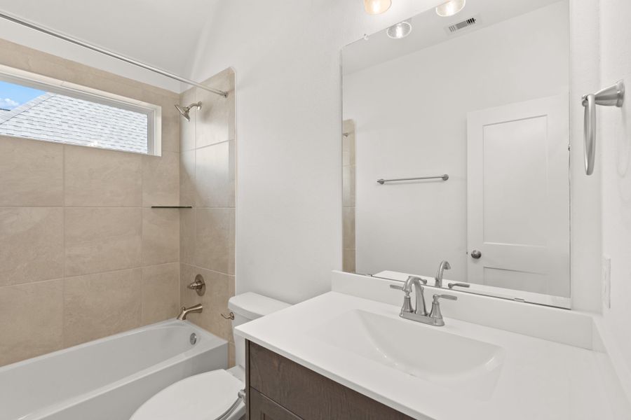 Furnished interior view inside a new home in Artavia, Conroe (Image 16).