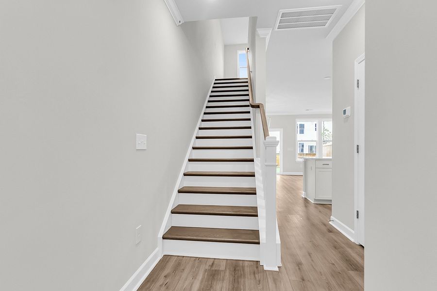 Spacious, unfurnished interior of a new home in Pineland Preserve, Summerville (Image 23).
