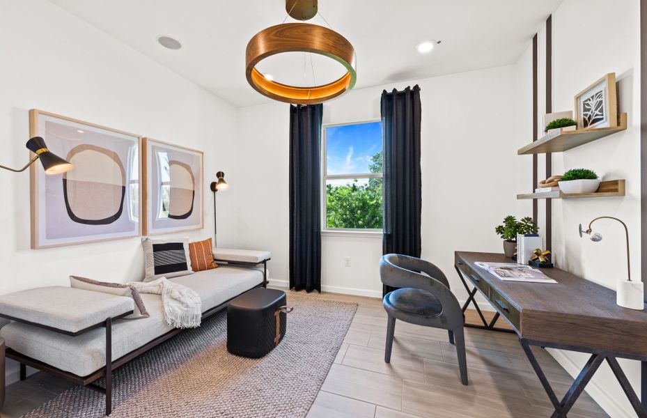 Representative furnished interior of a home built from the Cascadia by DiVosta in BeachWalk by Manasota Key, Englewood (Image 14).