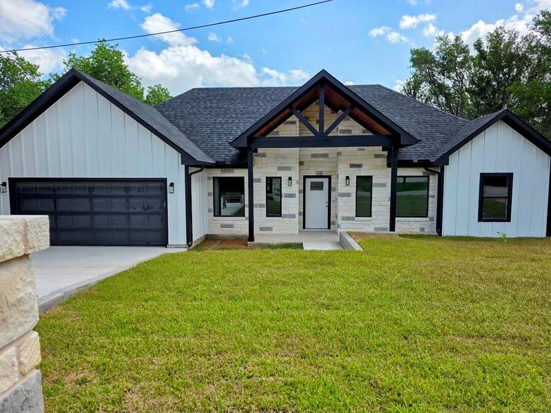 Modern farmhouse and attached garage Modern farmhouse and attached garage