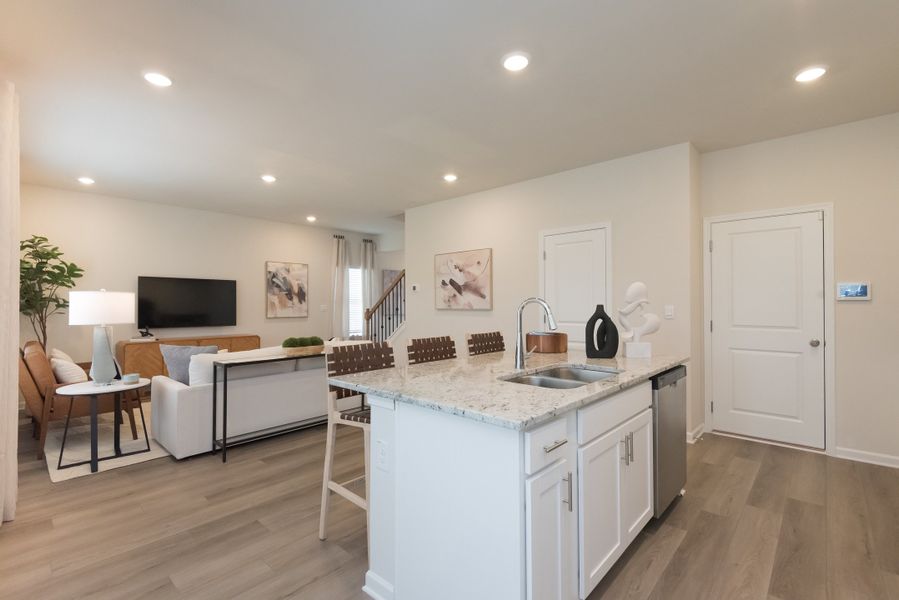 The beautiful granite countertop gives you ample space to prepare dinner or meal prep.