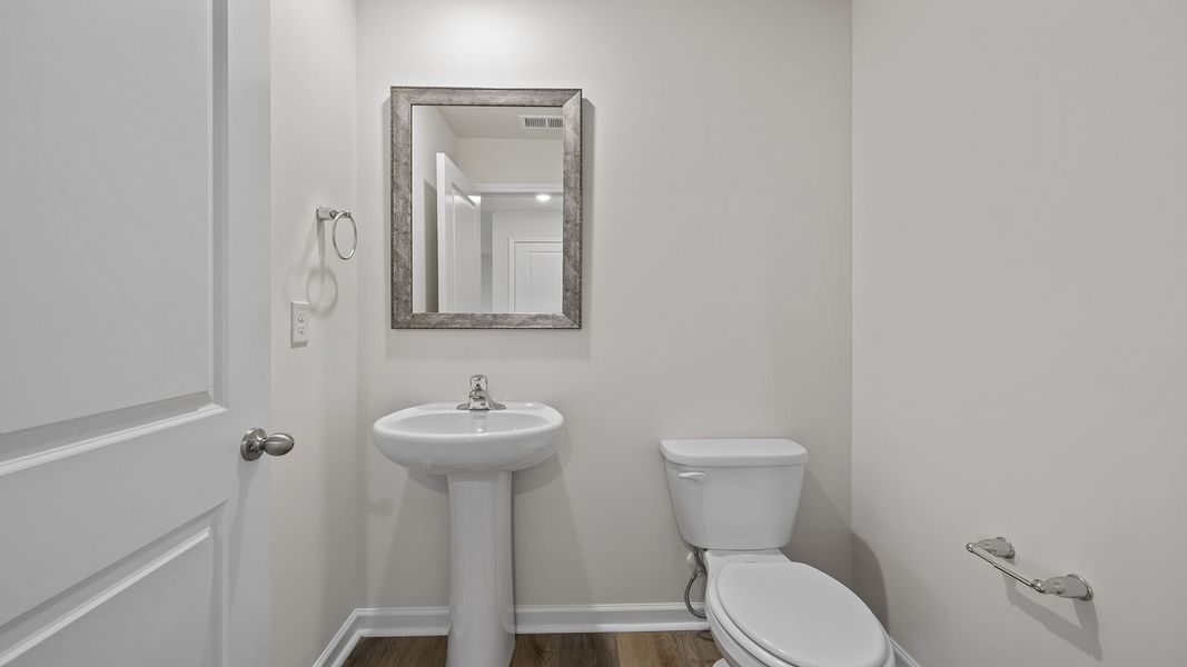 Furnished interior view inside a new home in Bentley Park, Greenwood (Image 7).