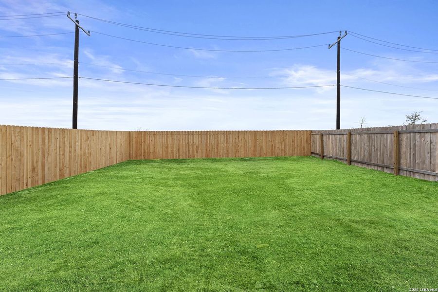 Exterior details and patio area of a home in Randolph Crossing, Converse (Image 2).