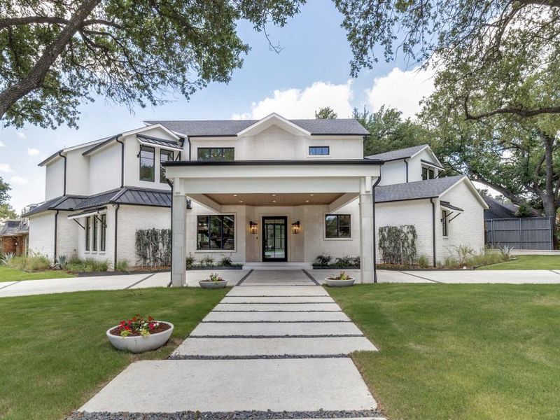 Front exterior of a new home in , Dallas, TX, highlighting curb appeal (Image 1). Front exterior of a new home in , Dallas, TX, highlighting curb appeal (Image 1).