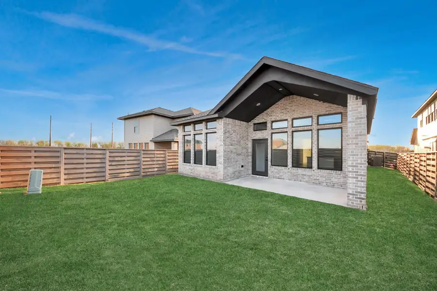 Exterior details and patio area of a home in Austin Point, Richmond (Image 3). Exterior details and patio area of a home in Austin Point, Richmond (Image 3).