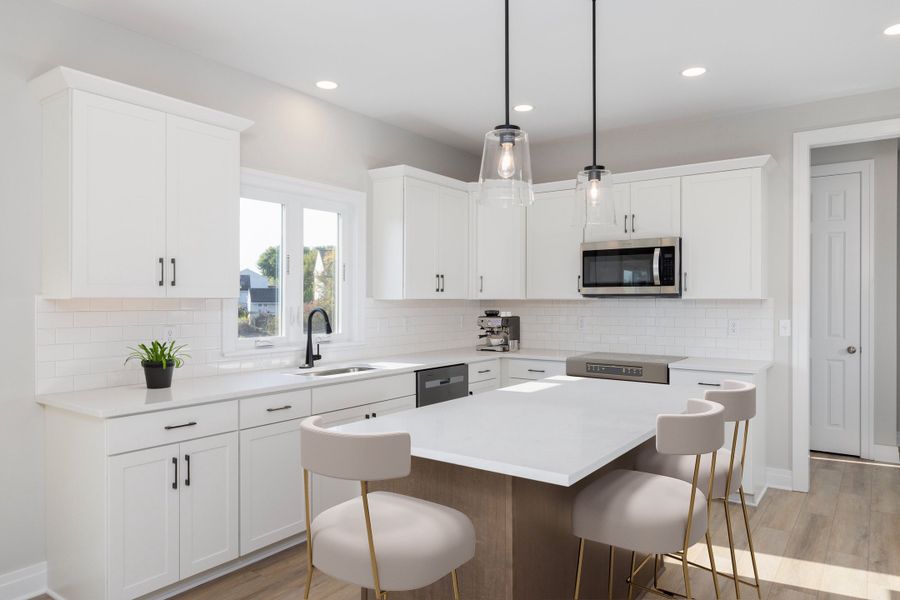 Representative furnished interior of a home built from the The Hawthorne by Forbes Capretto Homes in Cannon Woods, Clarence (Image 4).