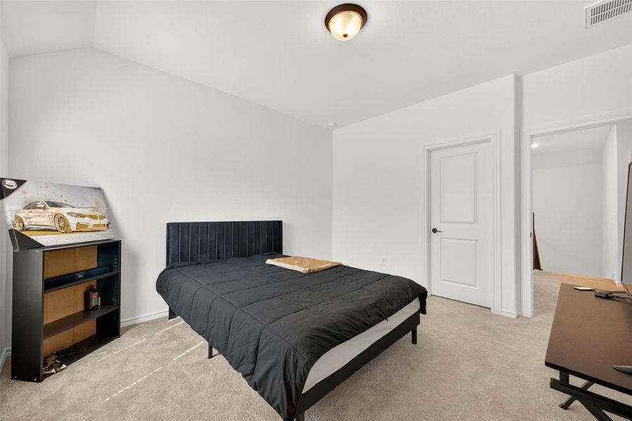 Furnished interior view inside a new home in Sunterra, Katy (Image 15).