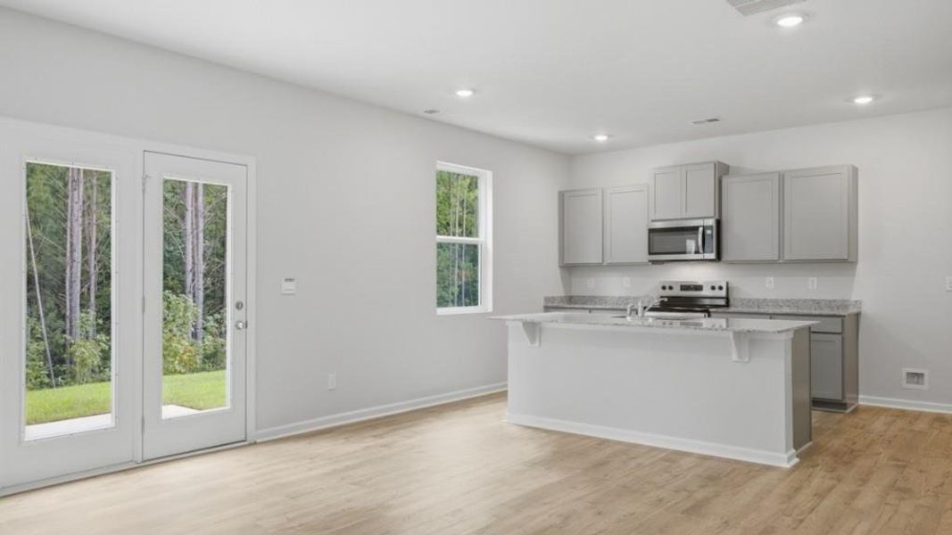 Furnished interior view inside a new home in Oaks at Cedar Grove, Fairburn (Image 4).