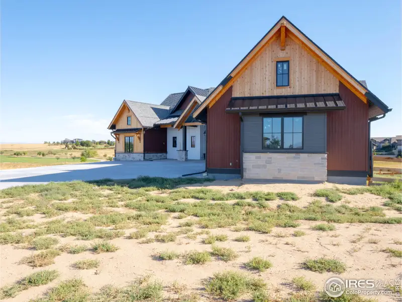 Front exterior of a new home in , Fort Collins, CO, highlighting curb appeal (Image 1). Front exterior of a new home in , Fort Collins, CO, highlighting curb appeal (Image 1).